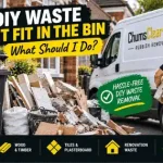 Pile of DIY renovation waste beside an overflowing wheelie bin